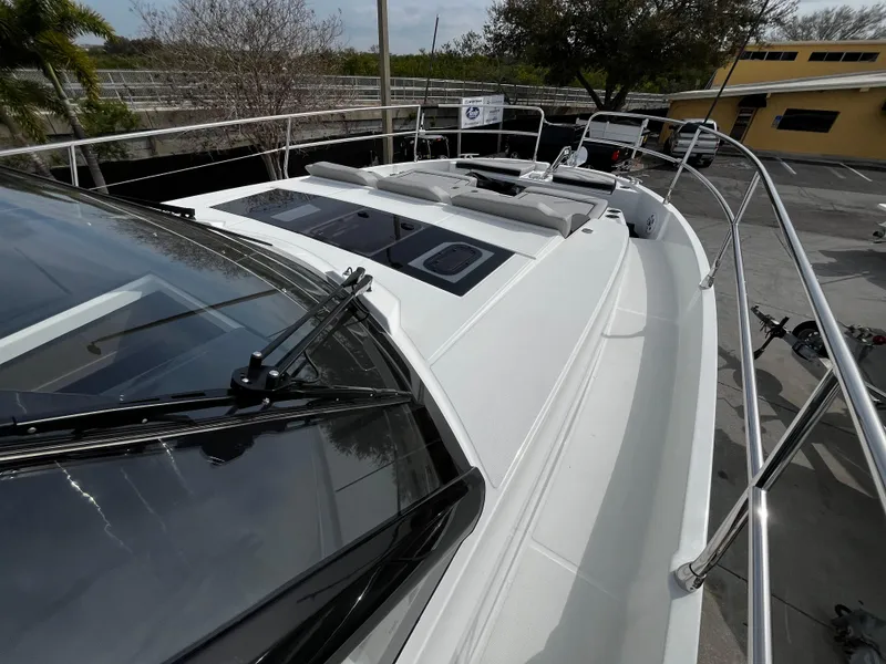 Slide: The Image of 2024 Jeanneau NC Weekender 1295 Fly deck view with sleek design and sunbathing area. - 32