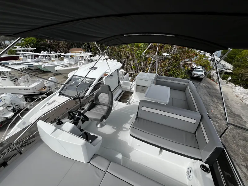 Slide: The Image of 2024 Jeanneau NC Weekender 1295 Flybridge with spacious seating and helm station. - 41