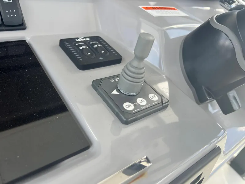 Slide: The Image of Close-up of the 2024 Jeanneau Leader 10.5 CC control panel. - 11