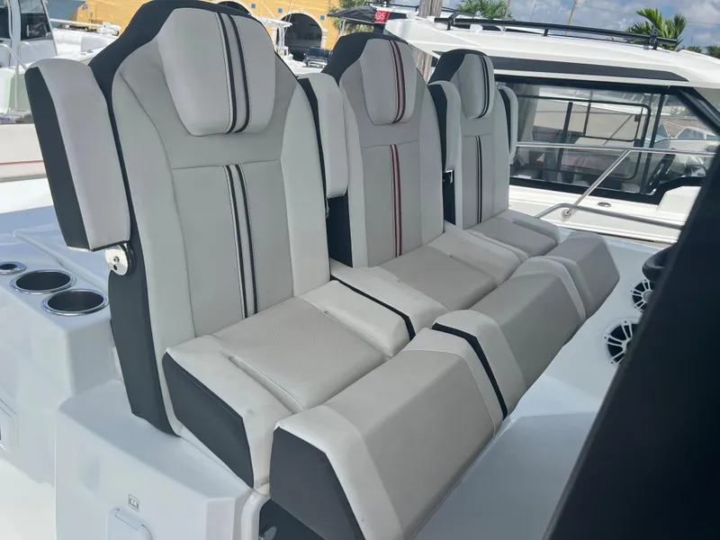 Slide: The Image of 2024 Jeanneau Leader 10.5 CC boat seats with modern design and comfortable upholstery. - 15