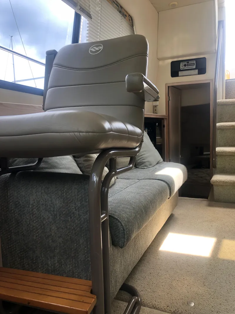 Slide: The Image of 1996 Bayliner 3587 Motoryacht interior with seating and stairs. - 33