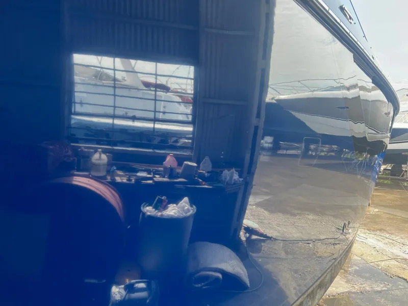 Slide: The Image of Reflection of a 2019 Monterey 378 Super Express yacht in a workshop. - 13