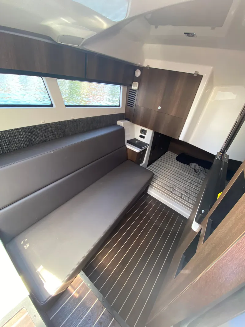 Slide: The Image of 2019 Monterey 378 Super Express cabin interior with modern furnishings and wood flooring. - 19