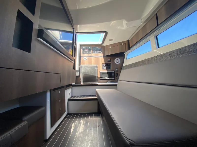 Slide: The Image of Interior of 2019 Monterey 378 Super Express yacht with modern furnishings and sleek design. - 21