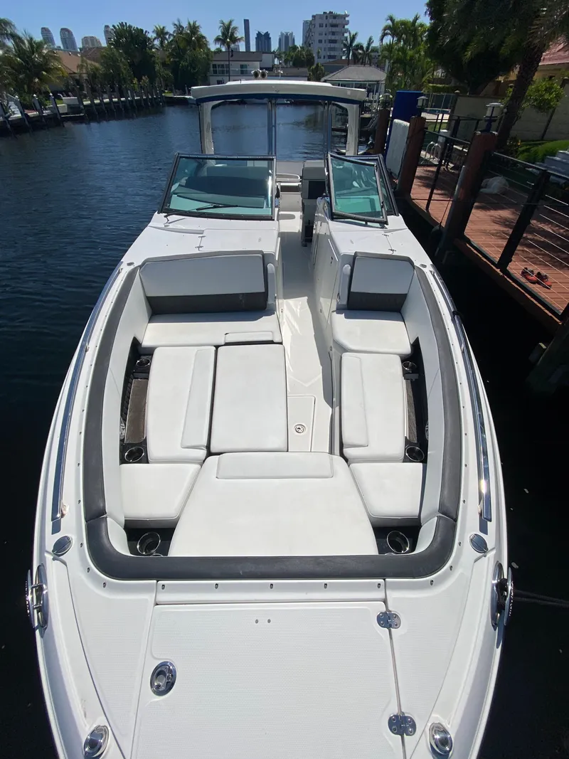 Slide: The Image of 2019 Monterey 378 Super Express boat with spacious seating on a sunny day. - 26