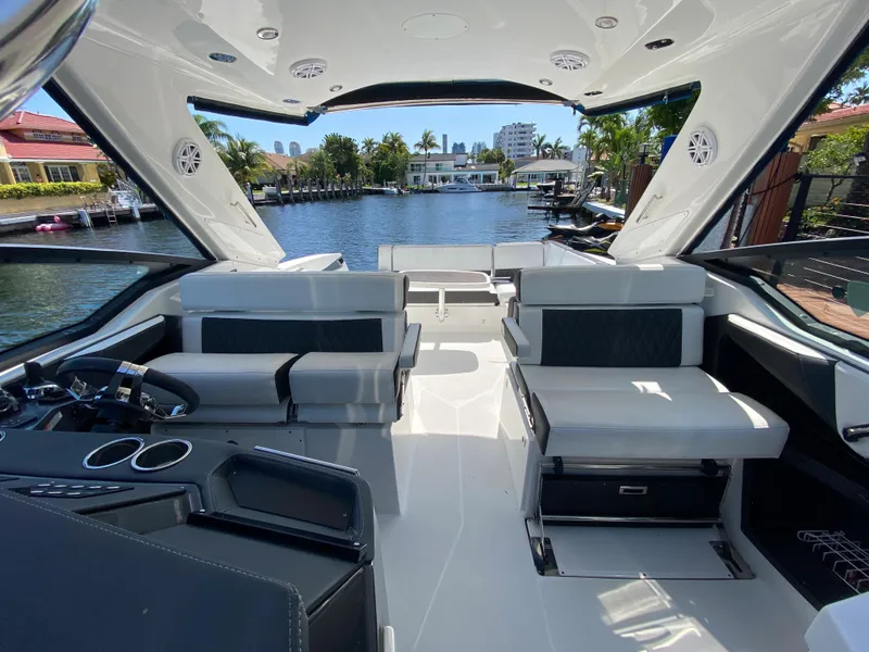 Slide: The Image of 2019 Monterey 378 Super Express luxury yacht interior with waterfront view. - 32