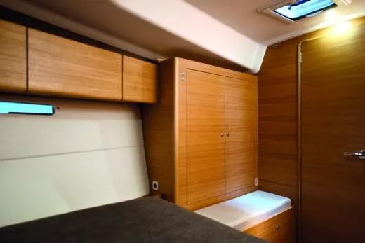 Slide: The Image of Interior of 2025 X-Yachts Pure X-4.3, featuring wooden cabinetry and modern design. - 10