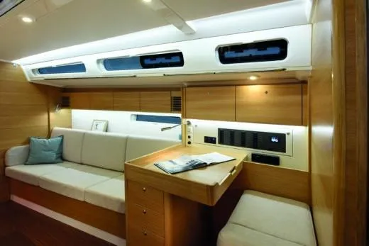 Slide: The Image of Luxurious interior of 2025 X-Yachts Pure X-4.3 with modern seating and wooden finishes. - 15