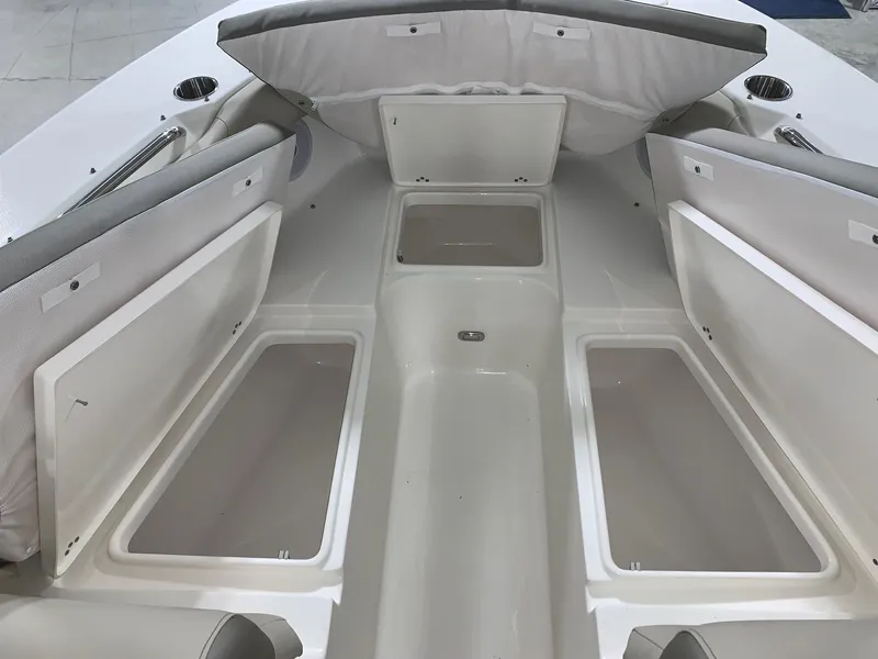 Slide: The Image of 2024 Key West 239 DFS boat interior with open storage compartments. - 7