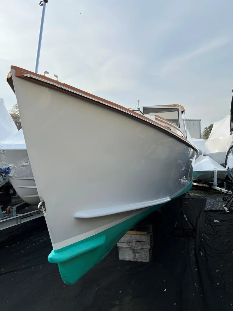 Slide: The Image of 1987 Custom Vansant 30 boat on dry dock, front view. - 12