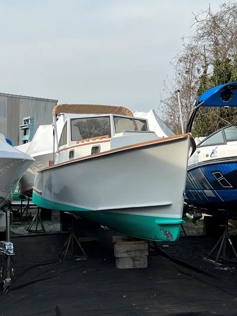 Slide: The Image of 1987 Custom Vansant 30 boat on stands in a boatyard. - 15