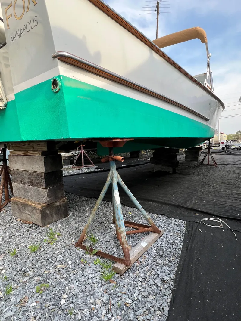 Slide: The Image of Alt text: 1987 Custom Vansant 30 boat on stands for maintenance in Annapolis. - 21