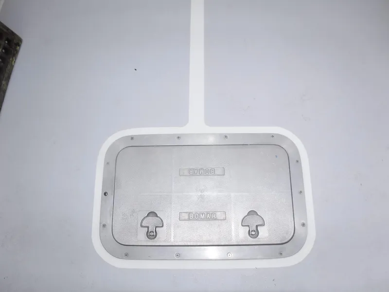 Slide: The Image of Hatch cover on 1987 Custom Vansant 30 boat deck. - 27