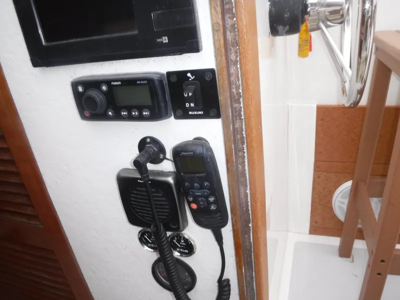 Slide: The Image of Control panel and communication devices on a 1987 Custom Vansant 30 boat. - 33