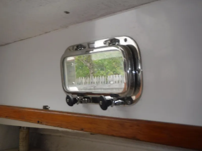 Slide: The Image of Stainless steel porthole window on 1987 Custom Vansant 30 boat. - 39