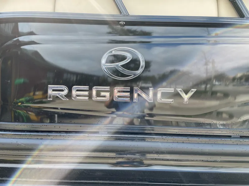 Slide: The Image of 2023 Regency 230 LE3 boat logo and branding - 3