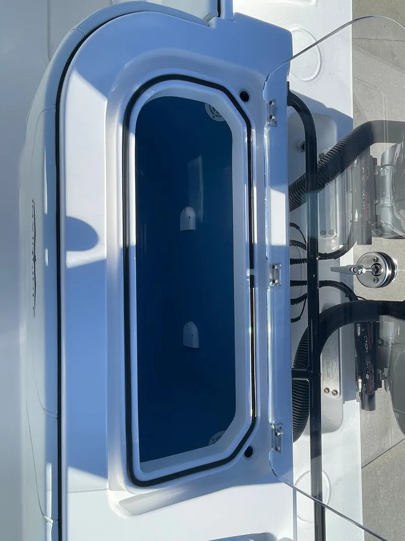 Slide: The Image of 2024 Invincible 33 Open Fisherman livewell with open lid. - 13