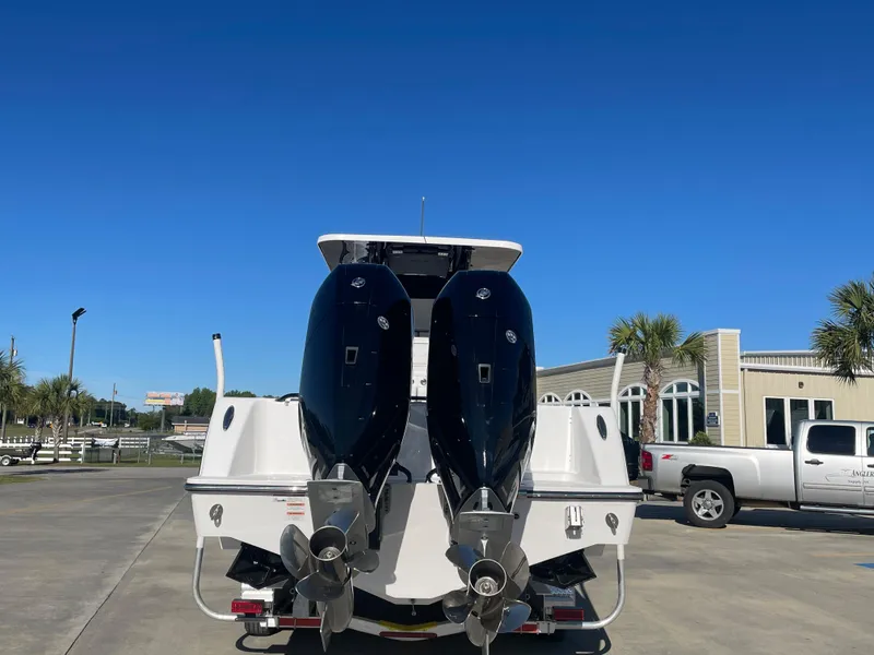 Slide: The Image of 2024 Invincible 33 Open Fisherman boat with twin outboard engines. - 3