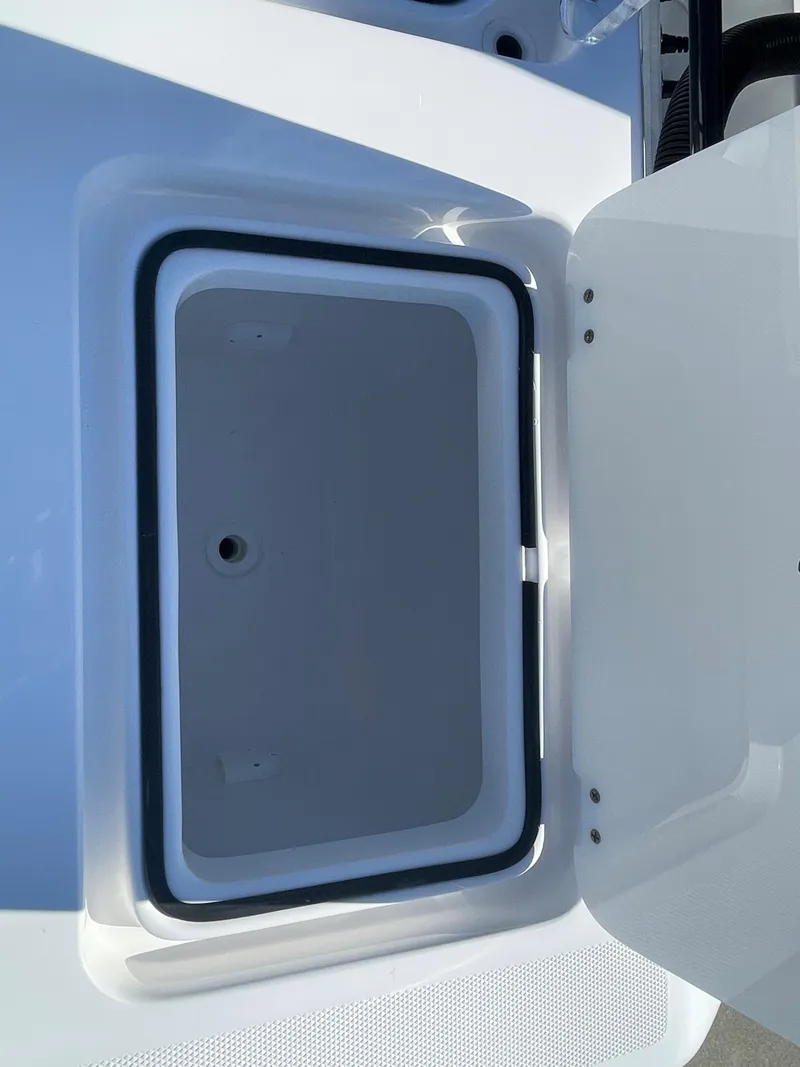 Slide: The Image of Open storage compartment on 2024 Invincible 33 Open Fisherman boat. - 14
