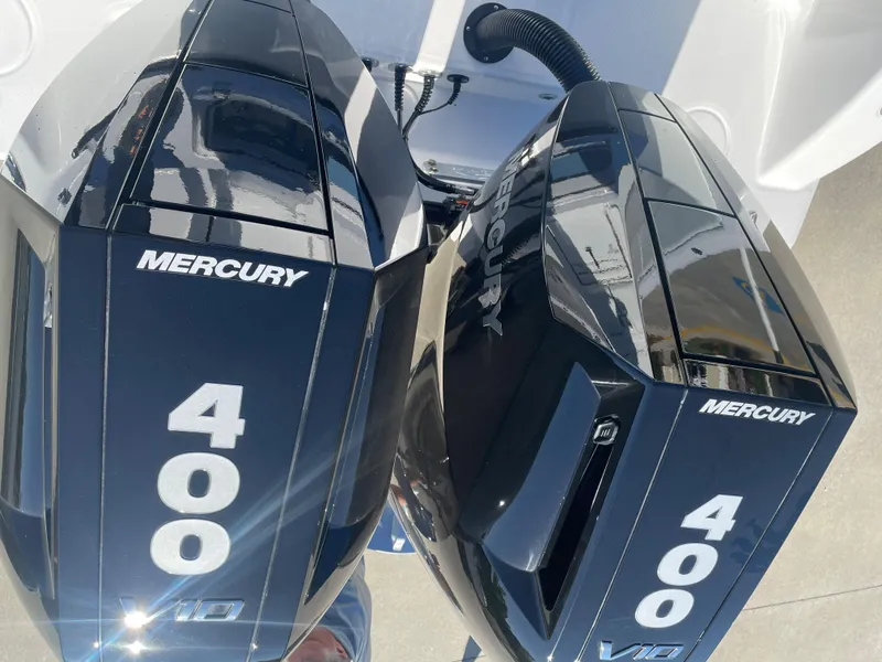Slide: The Image of Twin Mercury 400 V10 outboard engines on a 2024 Invincible 33 Open Fisherman boat. - 21