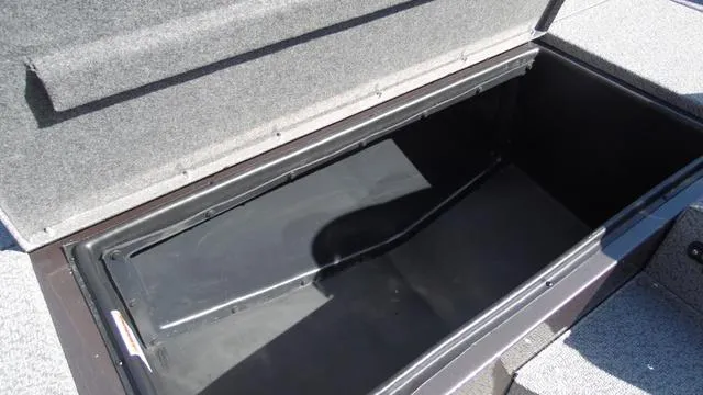 Slide: The Image of Open storage compartment of 2023 G3 Sportsman 1610 boat. - 12