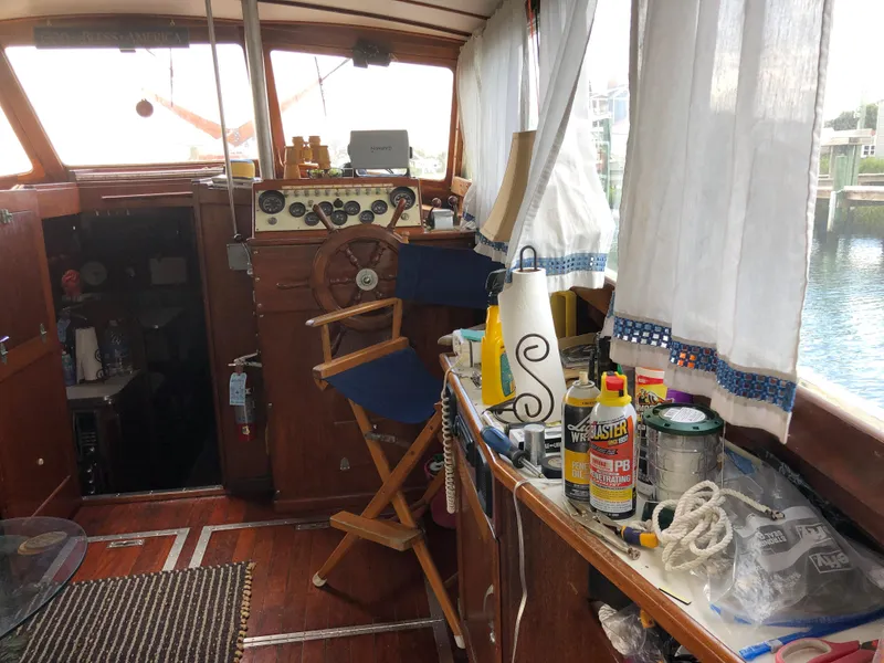 Slide: The Image of Interior of a 1963 Egg Harbor Convertible Cruiser with nautical decor and equipment. - 16