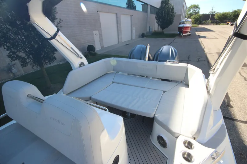 Slide: The Image of 2024 Zodiac MEDLINE 9 NEO boat with twin 300hp engines, featuring spacious seating area. - 10
