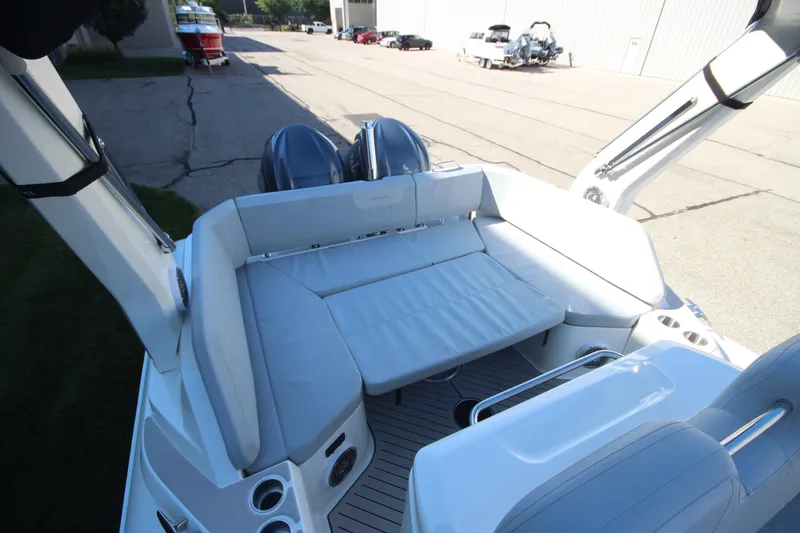 Slide: The Image of 2024 Zodiac MEDLINE 9 NEO boat with twin 300hp engines, featuring spacious seating area. - 11