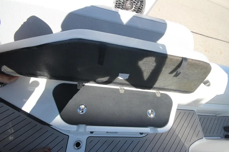 Slide: The Image of 2024 Zodiac MEDLINE 9 NEO boat storage compartment open, showcasing interior space. - 13