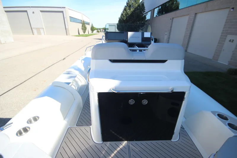 Slide: The Image of 2024 Zodiac MEDLINE 9 NEO boat, sleek design, docked outdoors, showcasing modern features. - 14