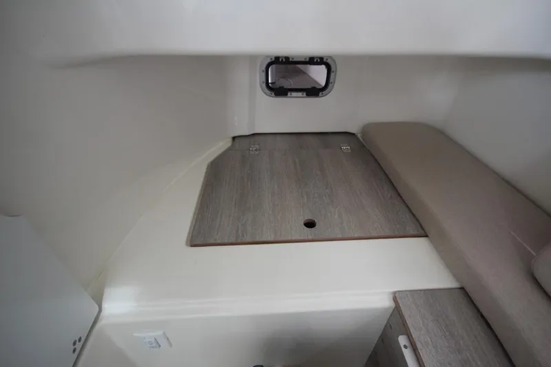Slide: The Image of 2024 Zodiac MEDLINE 9 NEO Twin 300hp cabin interior with window and seating. - 22