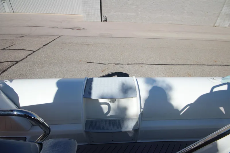 Slide: The Image of 2024 Zodiac MEDLINE 9 NEO boat deck with shadows, showcasing sleek design. - 24