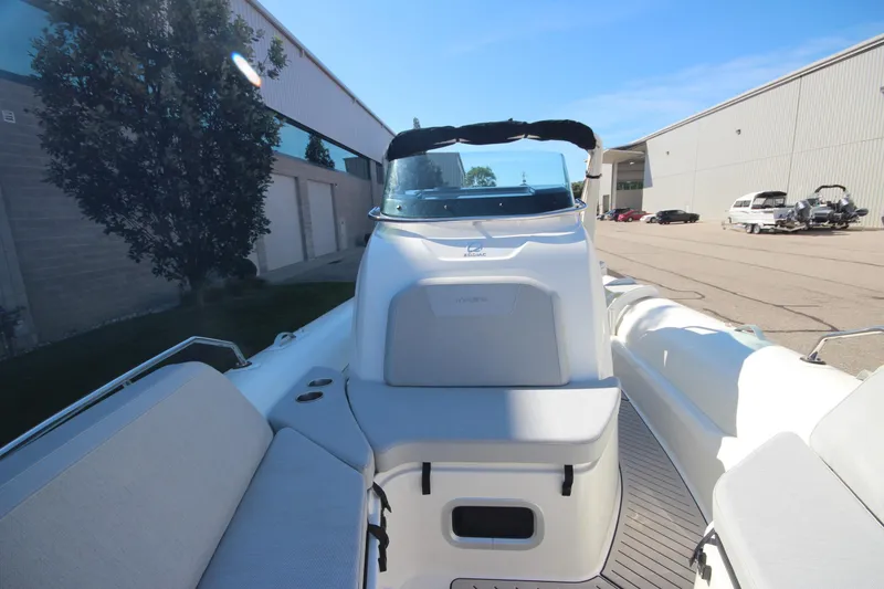Slide: The Image of 2024 Zodiac MEDLINE 9 NEO boat, interior view, showcasing seating and console. - 26