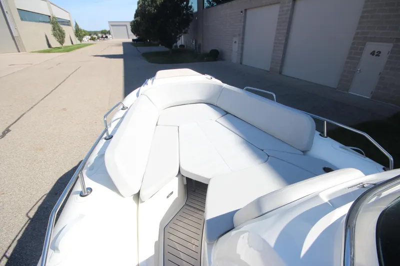 Slide: The Image of 2024 Zodiac MEDLINE 9 NEO boat with spacious seating, parked outdoors. - 31