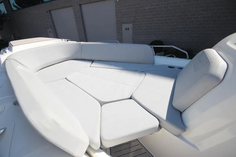 Slide: The Image of 2024 Zodiac MEDLINE 9 NEO boat with spacious white seating area. - 32