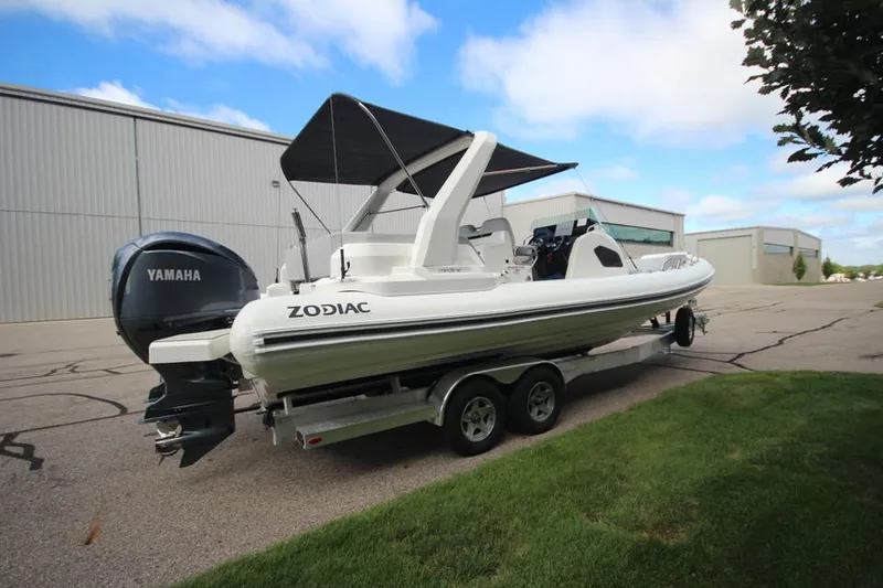 Slide: The Image of 2024 Zodiac MEDLINE 9 NEO Twin 300hp boat on trailer, side view. - 34