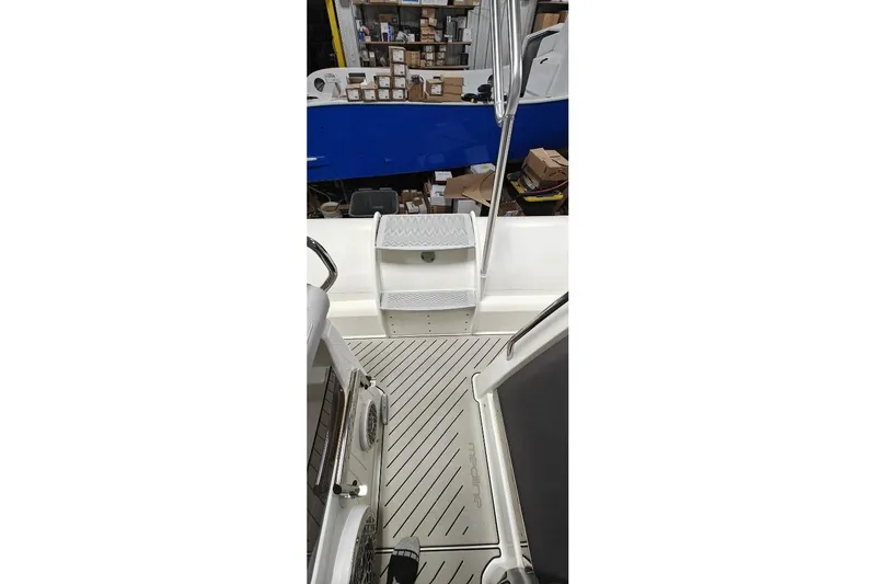 Slide: The Image of 2024 Zodiac MEDLINE 9 NEO boat interior with steps and storage area. - 36