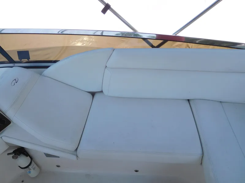 Slide: The Image of 2007 Regal 4080 Sportyacht interior seating with white upholstery. - 29