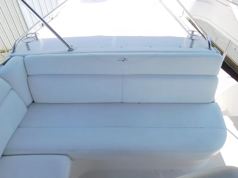 Slide: The Image of White seating area on 2007 Regal 4080 Sportyacht deck. - 30
