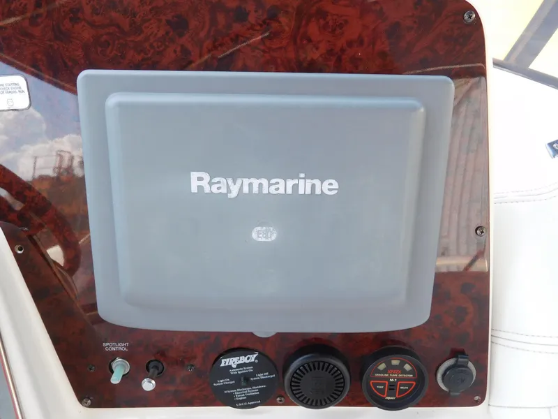 Slide: The Image of Raymarine navigation system on 2007 Regal 4080 Sportyacht dashboard. - 33