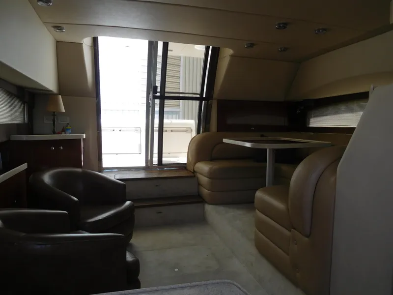Slide: The Image of Interior of 2007 Regal 4080 Sportyacht with leather seating and dining area. - 38
