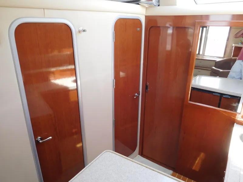 Slide: The Image of Interior of 2007 Regal 4080 Sportyacht with wooden doors and modern design. - 44