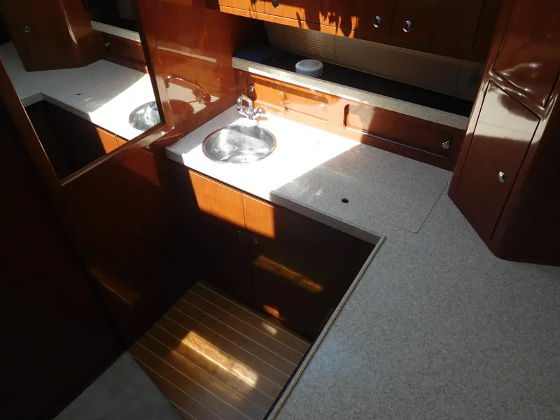 Slide: The Image of Interior of 2007 Regal 4080 Sportyacht with sink and wooden cabinetry. - 45