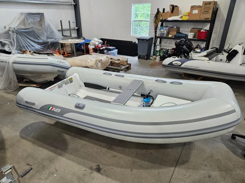Slide: The Image of 2023 AB Inflatables 10 AL inflatable boat in a workshop. - 3