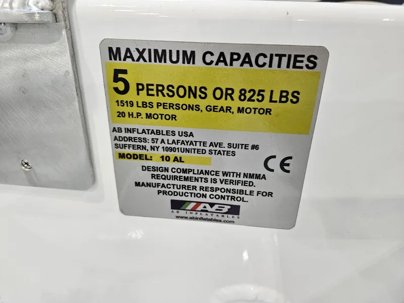 Slide: The Image of AB Inflatables 10 AL 2023 maximum capacities label: 5 persons or 825 lbs, 20 HP motor. - 7