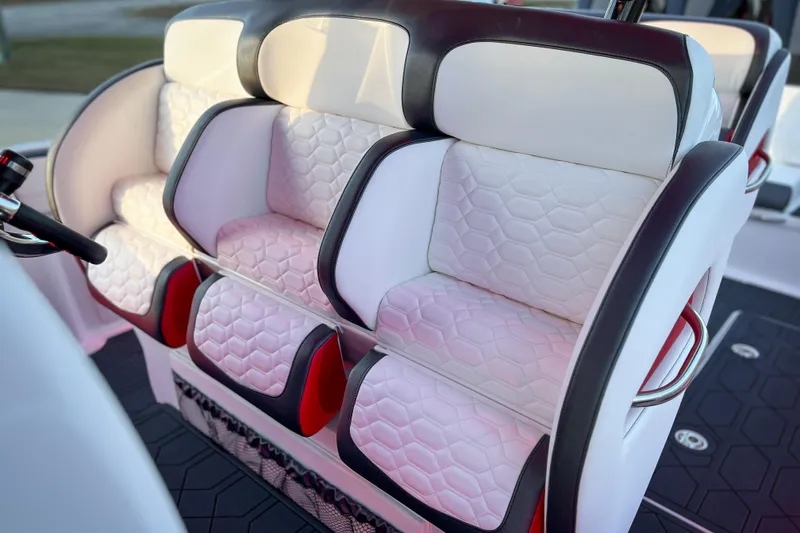 Slide: The Image of Luxurious seating on 2026 Nor-Tech 390 Sport boat with white and black upholstery. - 12