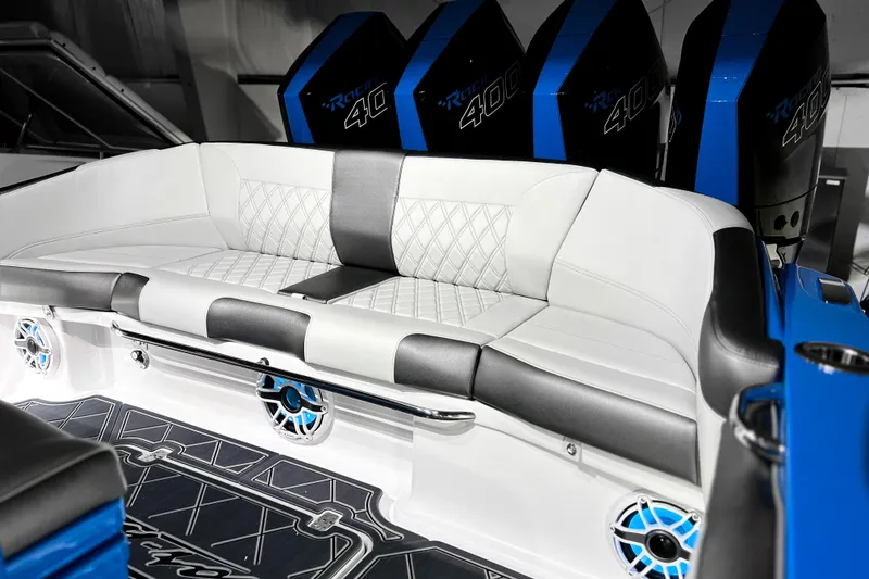 Slide: The Image of 2026 Nor-Tech 390 Sport boat interior with luxurious seating and powerful engines. - 14