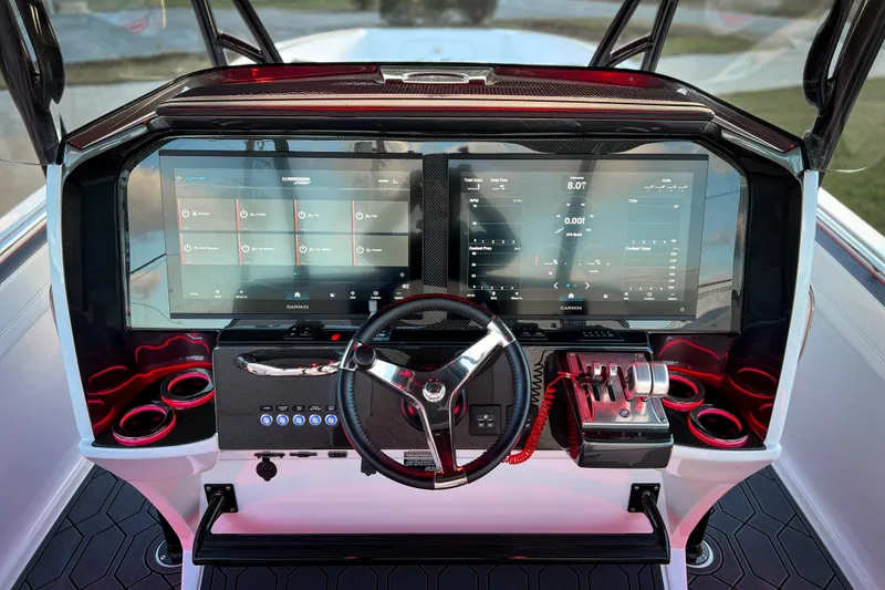 Slide: The Image of 2026 Nor-Tech 390 Sport dashboard with advanced navigation and control systems. - 7