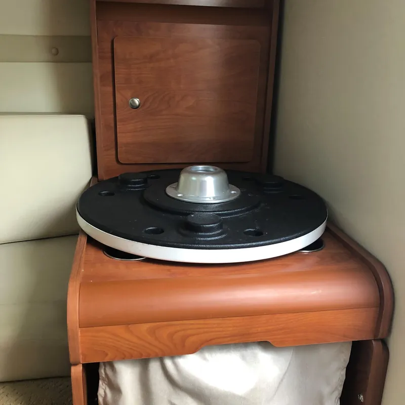 Slide: The Image of Interior of 2008 Rinker 230 Captiva boat with wooden cabinet and metal component. - 5