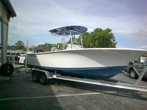 Slide: The Image of 2023 Sportsman 232 Open boat on trailer, parked outdoors. - 3